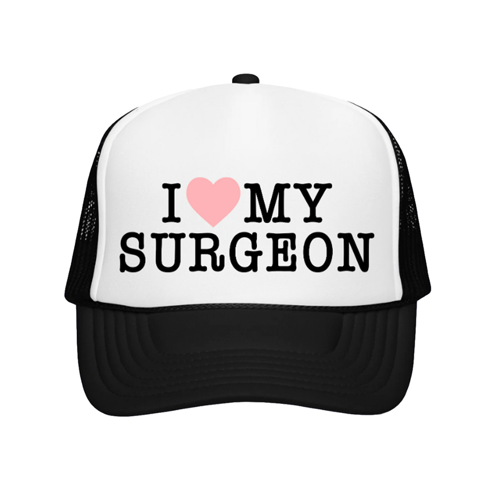 Trucker hat with 'I ❤️ MY SURGEON' text on a white background